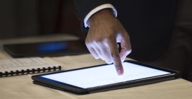 Finger on a tablet